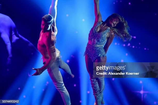 Helene Fischer and Thomas Seitel perform live on stage during the Bambi Awards 2017 show at Stage Theater on November 16, 2017 in Berlin, Germany.