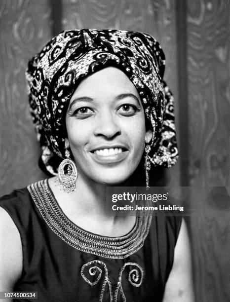 Portrait of American anthropologist and educator Johnnetta Betsch Cole, Amherst, Massachusetts, 1973. She wears a traditional African head wrap and...