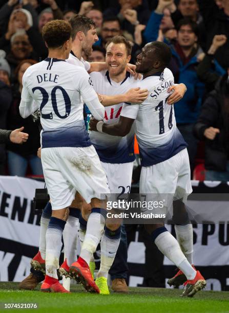 Christian Eriksen celebrates scoring the winning goal for Tottenham Hotspur with Moussa Cissoko, Ben Davies and Dele Alli during the Group B match of...