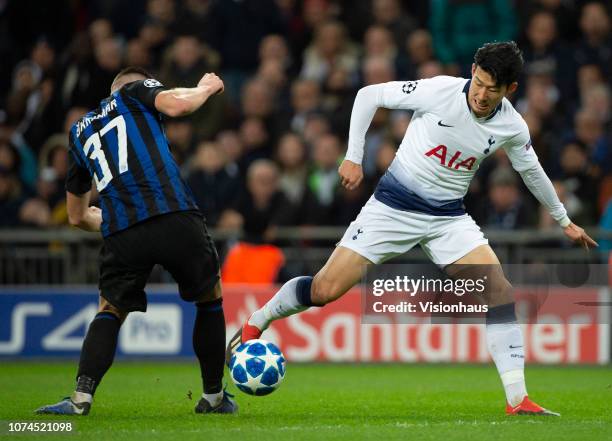 Son Heung-min of Tottenham Hotspur and Milan Škriniar FC Internazionale during the Group B match of the UEFA Champions League between Tottenham...