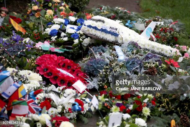 Floral tributes are pictured at a service to mark the 30th anniversary of the Lockerbie Air Disaster, the 1988 bombing of Pan Am flight 103 over the...