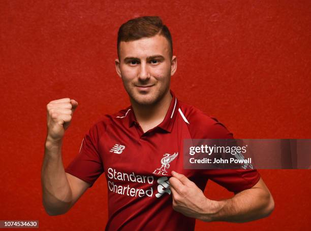 Herbie Kane of Liverpool signs a new contract at Melwood Training Ground on December 20, 2018 in Liverpool, England.