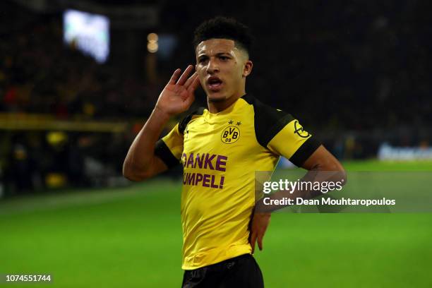 Jadon Sancho of Borussia Dortmund celebrates scoring his side's first goal during the Bundesliga match between Borussia Dortmund and Borussia...