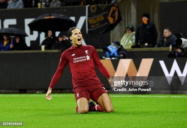 Virgil van dijk of Liverpool Scores the second goal and celebrates during the Premier League match between Wolverhampton Wanderers and Liverpool FC...