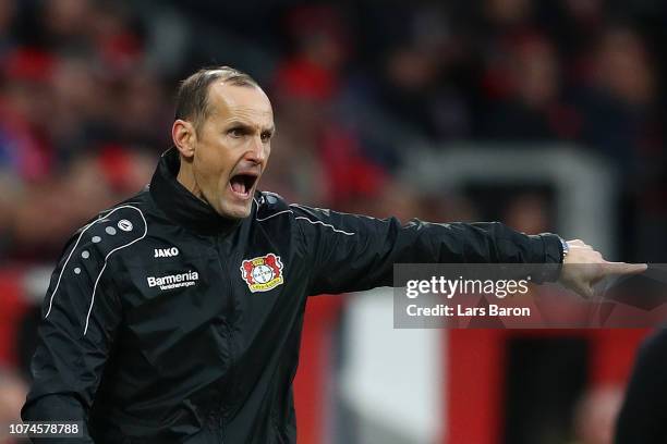 Heiko Herrlich, Manager of Bayer 04 Leverkusen gives his team instructions during the Bundesliga match between Bayer 04 Leverkusen and Hertha BSC at...