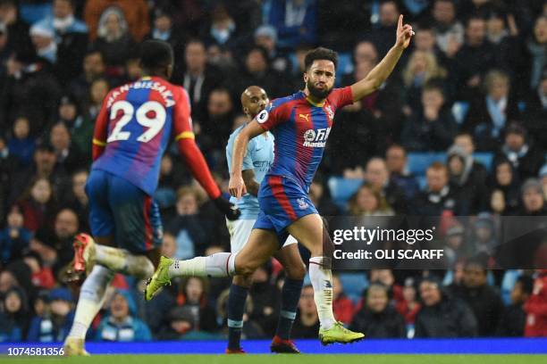 Crystal Palace's English midfielder Andros Townsend celebrates scoring their second goal to take the lead 1-2 during the English Premier League...