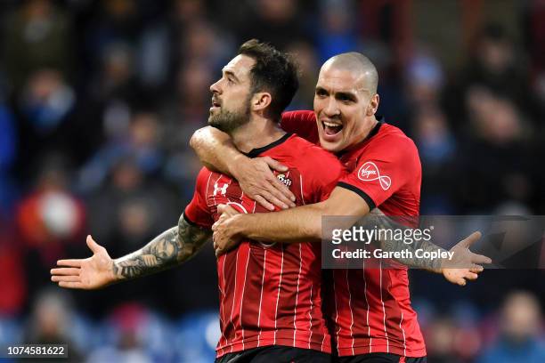 Danny Ings of Southampton celebrates after scoring his team's second goal with Oriol Romeu of Southampton during the Premier League match between...