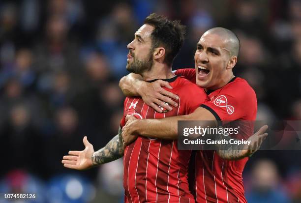 Danny Ings of Southampton celebrates after scoring his team's first goal with Oriol Romeu of Southampton during the Premier League match between...
