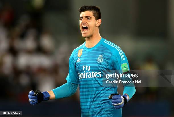 Thibaut Courtois of Real Madrid celebrates his sides first goal during the FIFA Club World Cup UAE 2018 Final between Al Ain and Real Madrid at the...