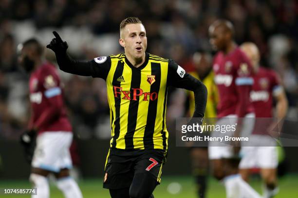 Gerard Deulofeu of Watford celebrates after scoring his team's second goal during the Premier League match between West Ham United and Watford FC at...