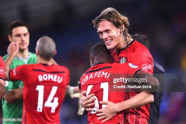 Michael Obafemi of Southampton celebrates victory with Jannik Vestergaard of Southampton after the Premier League match between Huddersfield Town and...