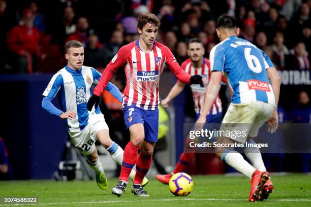 Antoine Griezmann of Atletico Madrid, Oscar Duarte of Espanyol during the La Liga Santander match between Atletico Madrid v Espanyol at the Estadio...