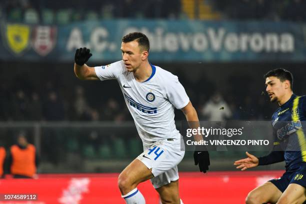 Inter Milan's Croatian midfielder Ivan Perisic celebrates after opening the scoring during the Italian Serie A Football match Chievo Verona vs Inter...