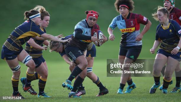 Davinia Catlin of Harlequins Ladies takes on the Worcester Valkyries defence during the Tyrrells Premier 15s match between Harlequins Ladies and...