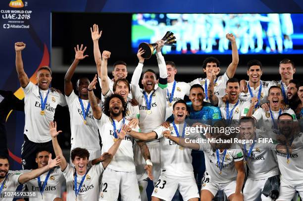 Sergio Ramos of Real Madrid lifts the FIFA Club World Cup trophy following the FIFA Club World Cup UAE 2018 Final between Al Ain and Real Madrid at...