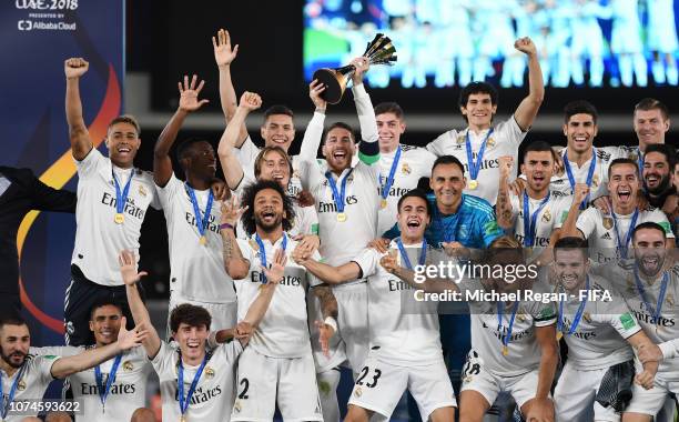 Sergio Ramos of Real Madrid lifts the FIFA Club World Cup trophy following the FIFA Club World Cup UAE 2018 Final between Al Ain and Real Madrid at...