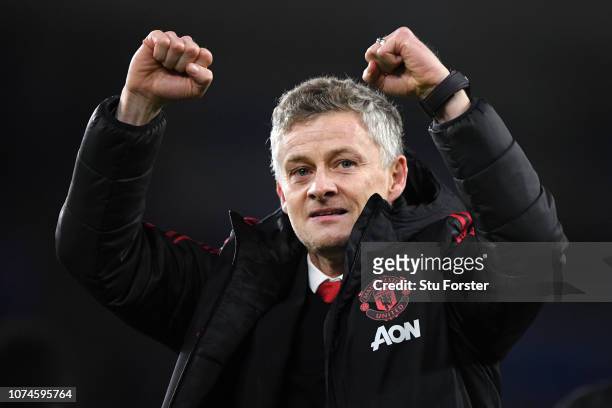 Ole Gunnar Solskjaer, Interim Manager of Manchester United celebrates following his sides victory in the Premier League match between Cardiff City...