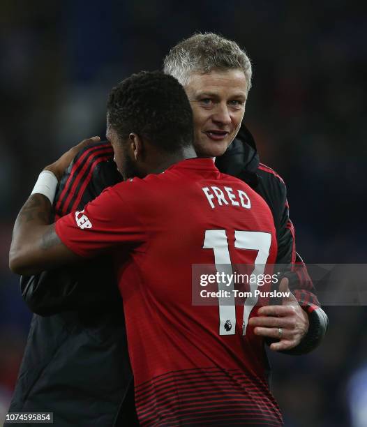 Caretaker Manager Ole Gunnar Solskjaer of Manchester United celebrates with Fred after the Premier League match between Cardiff City and Manchester...