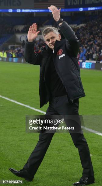Caretaker Manager Ole Gunnar Solskjaer of Manchester United celebrates after the Premier League match between Cardiff City and Manchester United at...