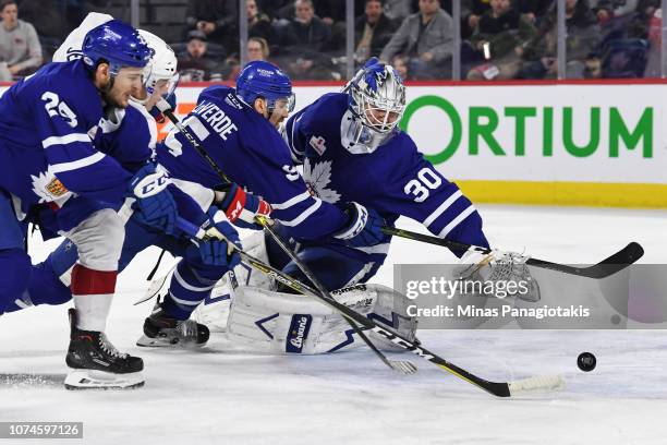 Goaltender Kasimir Kaskisuo of Toronto Marlies reaches behind him for the puck against the Laval Rocket during the AHL game at Place Bell on December...