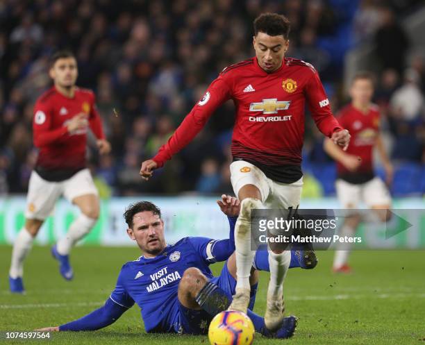 Jesse Lingard of Manchester United in action with Sean Morrison of Cardiff City during the Premier League match between Cardiff City and Manchester...