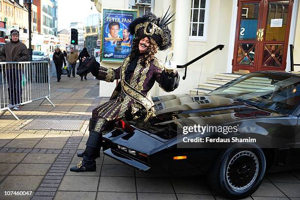 David Hasselhoffb poses alongside KITT car to launch the Peter Pan pantomime at New Wimbledon Theatre on December 9, 2010 in Wimbledon, England.