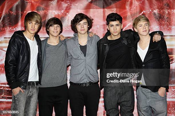 Boyband One Direction pose for a photocall to promote the X-Factor final held at The Connaught Hotel on December 9, 2010 in London, England.