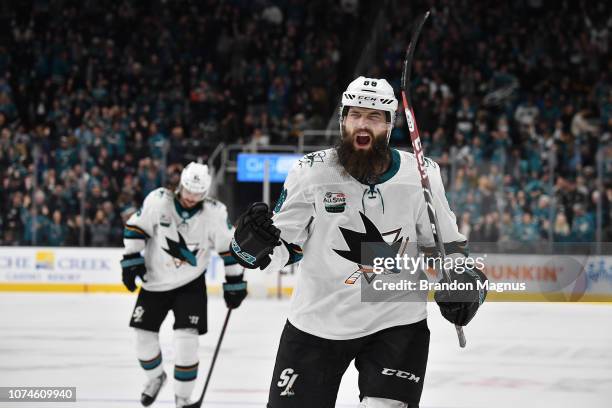 Brent Burns of the San Jose Sharks celebrate a game-tying goal against the Los Angeles Kings at SAP Center on December 22 2018 in San Jose, California