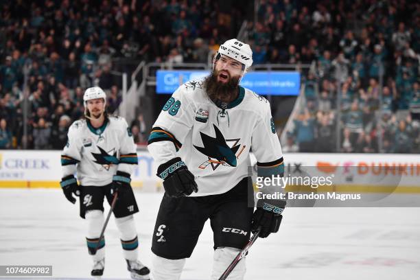 Brent Burns of the San Jose Sharks celebrate a game-tying goal against the Los Angeles Kings at SAP Center on December 22 2018 in San Jose, California