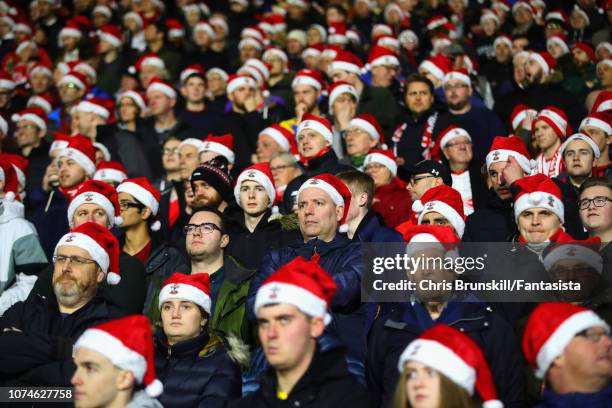 Fans watch the action during the Premier League match between Huddersfield Town and Southampton FC at John Smith's Stadium on December 22, 2018 in...