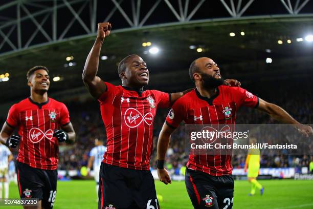 Michael Obafemi of Southampton FC celebrates scoring his sides third goal during the Premier League match between Huddersfield Town and Southampton...