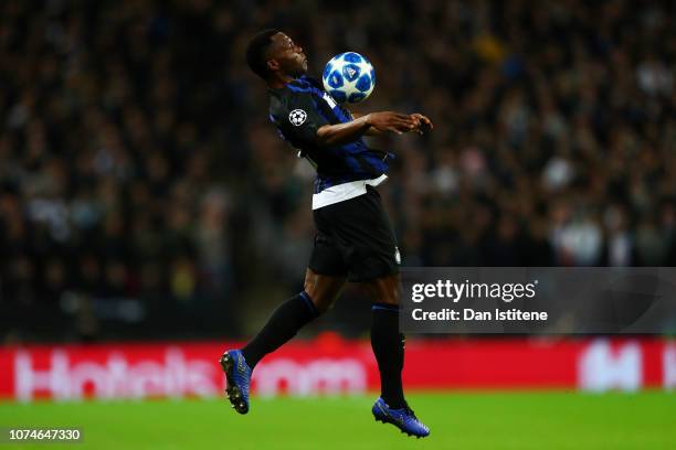 Kwadwo Asamoah of Internazionale controls the ball during the Group B match of the UEFA Champions League between Tottenham Hotspur and FC...