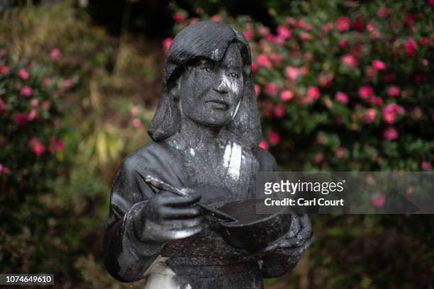 Statue depicting a woman with chopsticks and a bowl is displayed in a statue garden on December 23, 2018 in Toyama, Japan. The park was built in 1989...