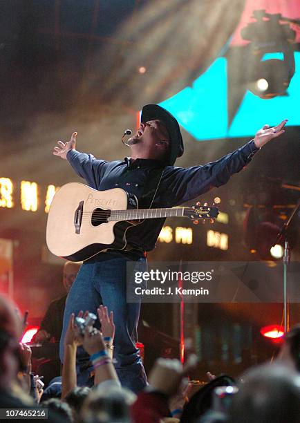 Garth Brooks performs "Good Ride Cowboy" during The 39th Annual CMA Awards - Garth Brooks Performs in Times Square at Times Square in New York City,...