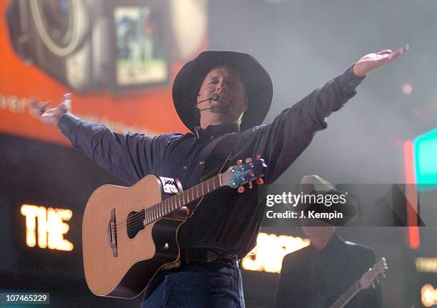 Garth Brooks performs "Good Ride Cowboy" during The 39th Annual CMA Awards - Garth Brooks Performs in Times Square at Times Square in New York City,...