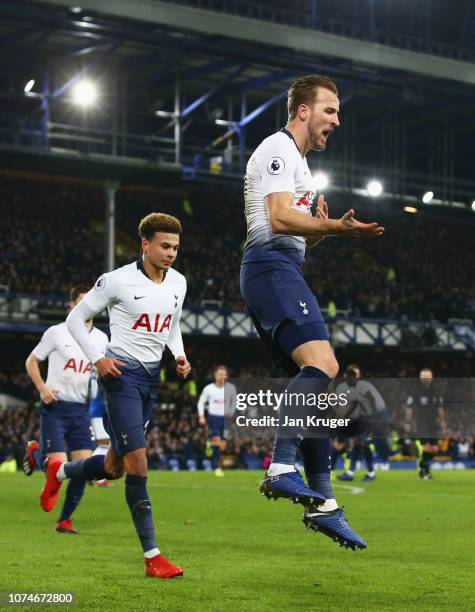 Harry Kane of Tottenham Hotspur celebrates after scoring his team's third goal with team mate Dele Alli during the Premier League match between...