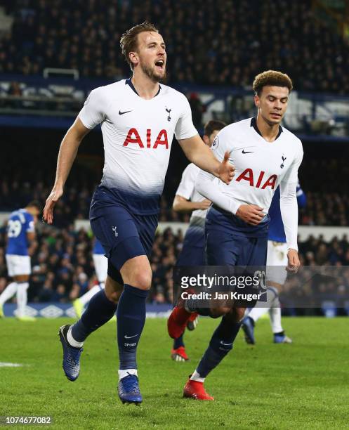 Harry Kane of Tottenham Hotspur celebrates after scoring his team's third goal with team mate Dele Alli during the Premier League match between...