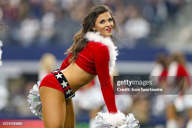 The Dallas Cowboys Cheerleaders perform in Christmas costumes during the game between the Dallas Cowboys and Tampa Bay Buccaneers on December 23,...