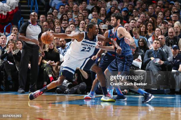 Andrew Wiggins of the Minnesota Timberwolves jocks for a position during the game against Alex Abrines of the Oklahoma City Thunder on December 23,...