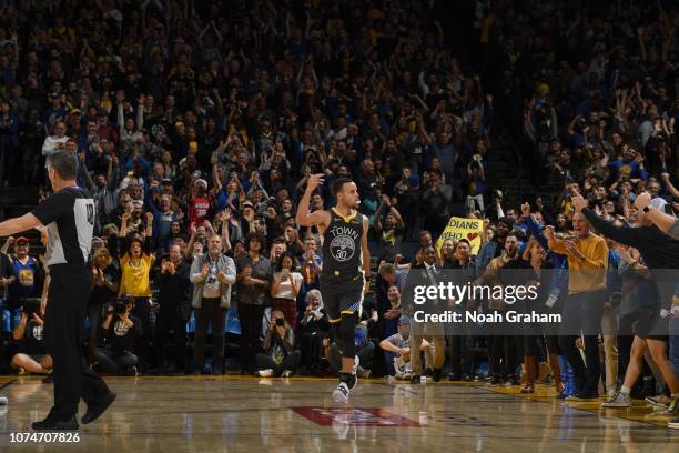 Stephen Curry of the Golden State Warriors celebrates the game-winning shot against the LA Clippers on December 23, 2018 at ORACLE Arena in Oakland,...