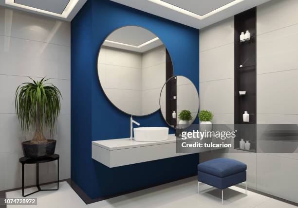 luxury minimalist bathroom with royal blue wall and large white tiles - royal blue stock pictures, royalty-free photos & images