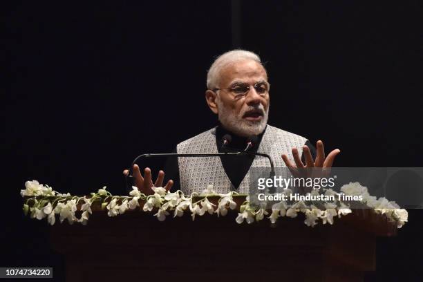 Prime Minister Narendra Modi addresses after the release of a commemorative coin in honour of Bharat Ratna Atal Bihari Vajpayee, at Parliament House...