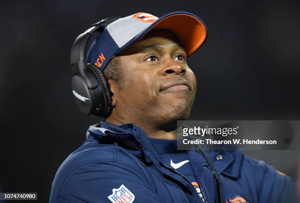 Head coach Vance Joseph of the Denver Broncos looks on from the sidelines against the Oakland Raiders during their NFL football game at the...