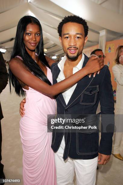 Jessica White and John Legend during 2005 MTV Video Music Awards - White Carpet at American Airlines Arena in Miami, Florida, United States.