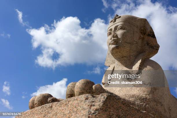 ruins sphinx and cloudy day near pompey's pillar at alexandria city egypt - alexandria egypt stock pictures, royalty-free photos & images