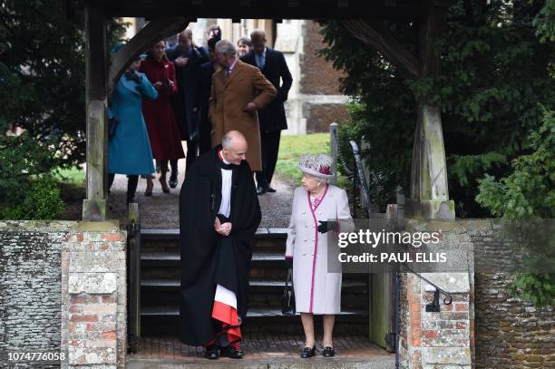 Britain's Queen Elizabeth II departs after the Royal Family's traditional Christmas Day service at St Mary Magdalene Church in Sandringham, Norfolk,...