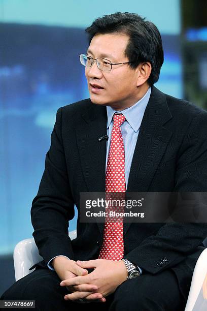 Gerry Wang, chief executive officer of Seaspan Corp., speaks during a television interview in New York, U.S., on Wednesday, Dec. 8, 2010. Wang says...