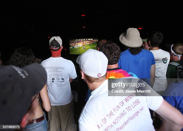 Fans watch the World Cup match between the United States and Italy at the Cinema Tent