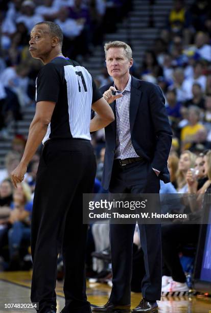 Head coach Steve Kerr of the Golden State Warriors complains about a call to referee Rodney Mott during the second half of their NBA Basketball game...