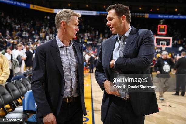 Head Coaches Luke Walton of the Los Angeles Lakers and Steve Kerr of the Golden State Warriors talk after a game on December 25, 2018 at ORACLE Arena...